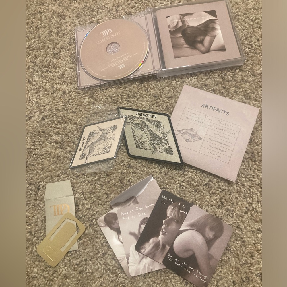 The Tourtured Poets Department CD, The Bolter Edition, by Taylor Swift.